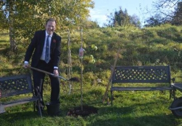 Jesse Norman MP planting at Ross on Wye Community Garden
